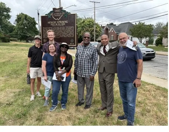 Tour group at the Hough Uprising historical marker in Cleveland